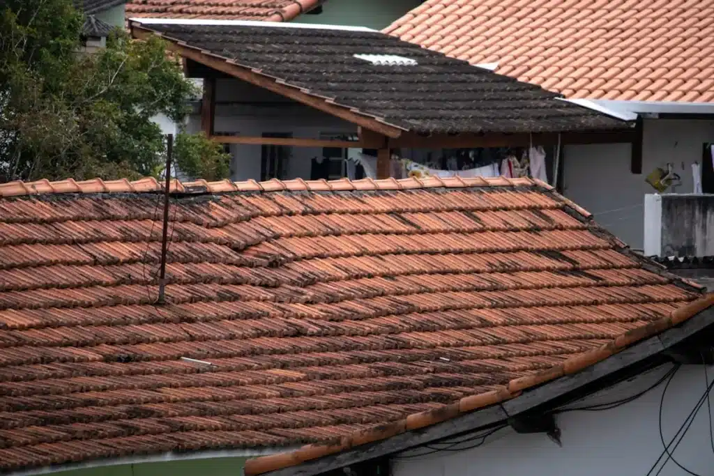 Damaged shingles before a roof repair in Brentwood, TN