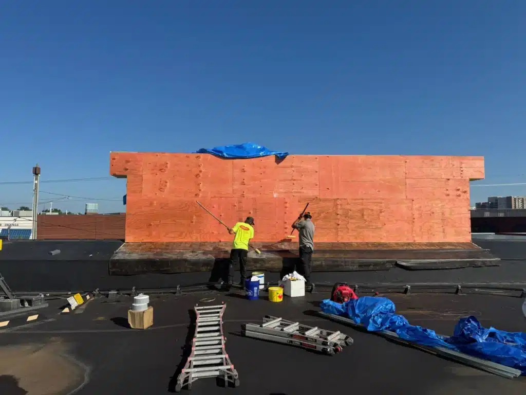 Southern Roofing Co. crew installing roof decking on a commercial flat roof in Nashville
