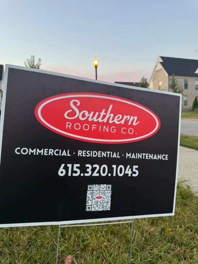 Southern Roofing Co. yard sign in a Nashville-area residential neighborhood at dusk