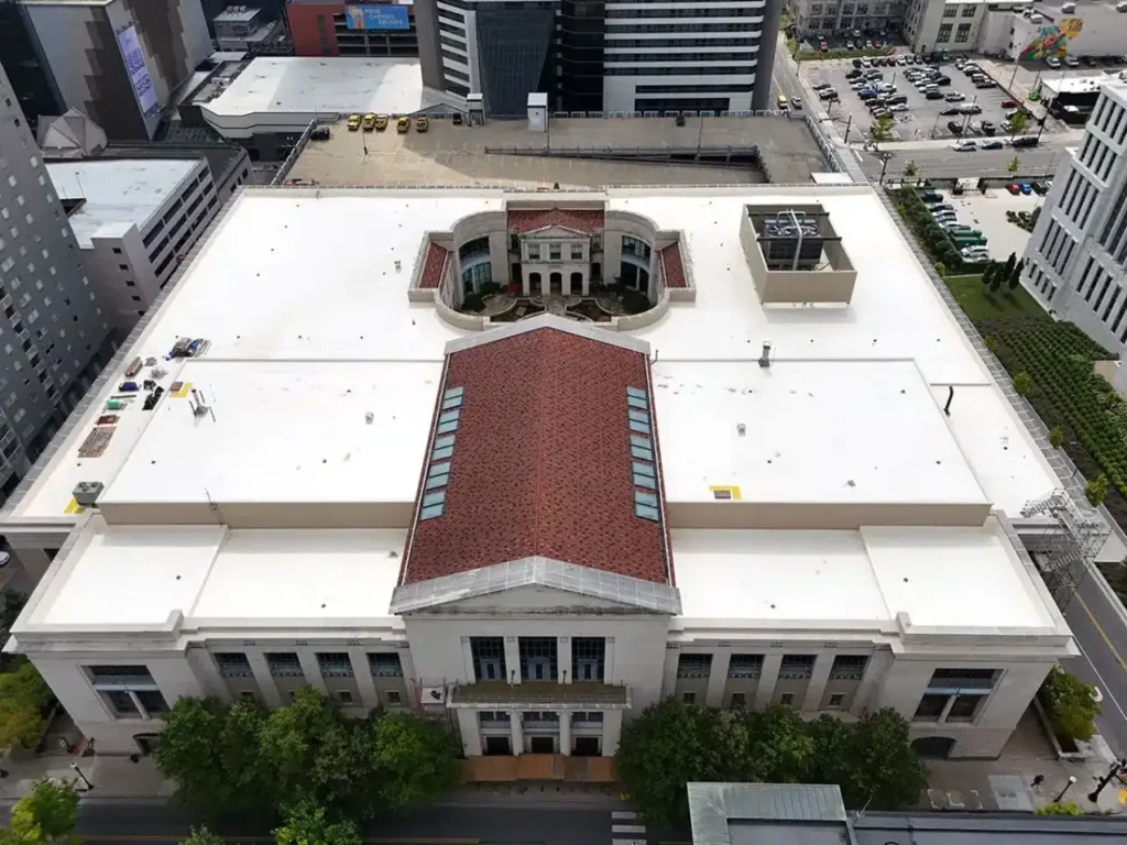 Aerial view of a commercial flat roof project by Southern Roofing Co.